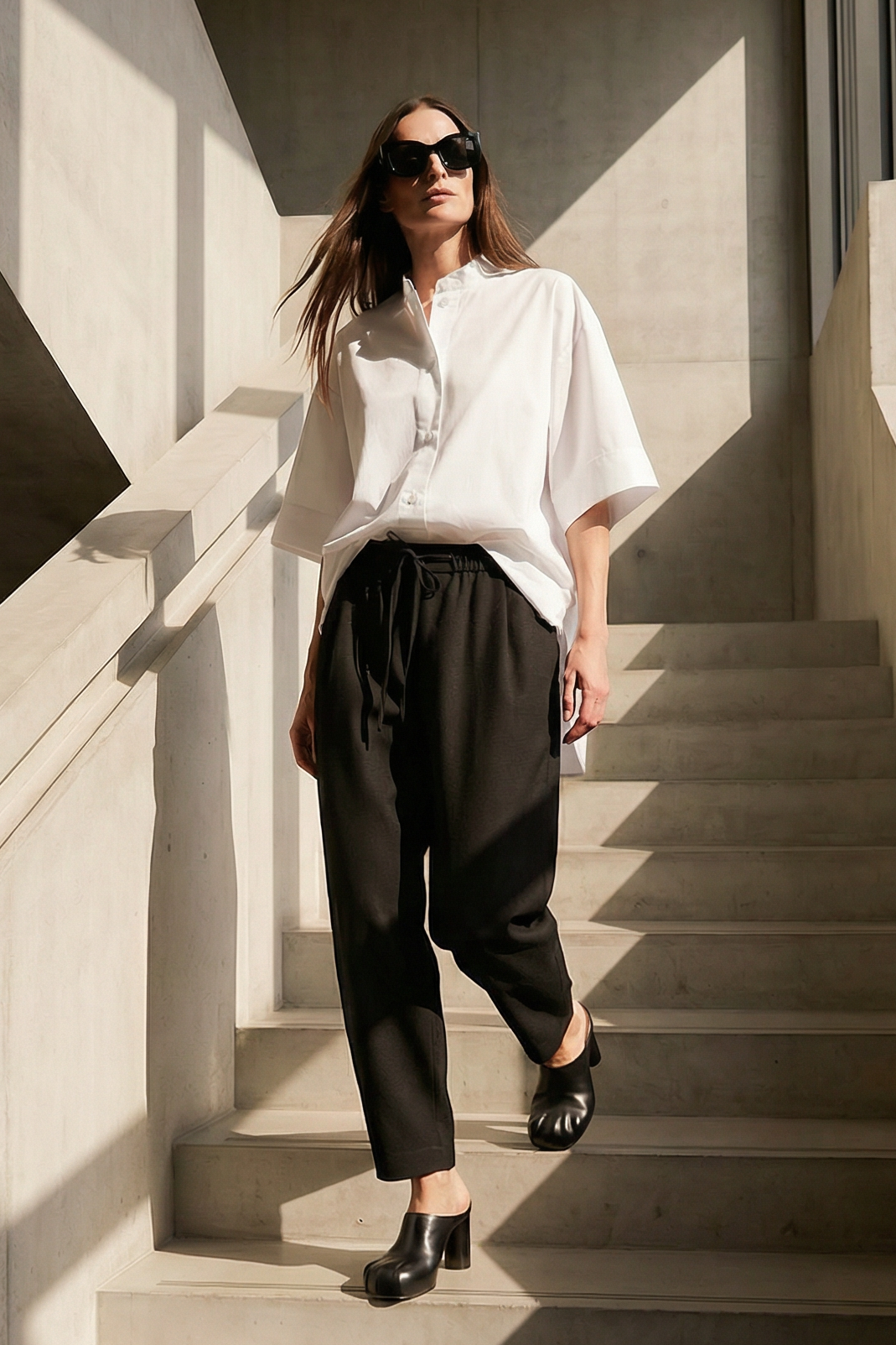 Black tapered trousers