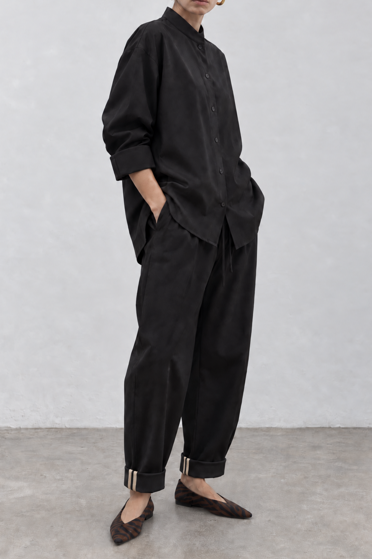 Black tapered trousers