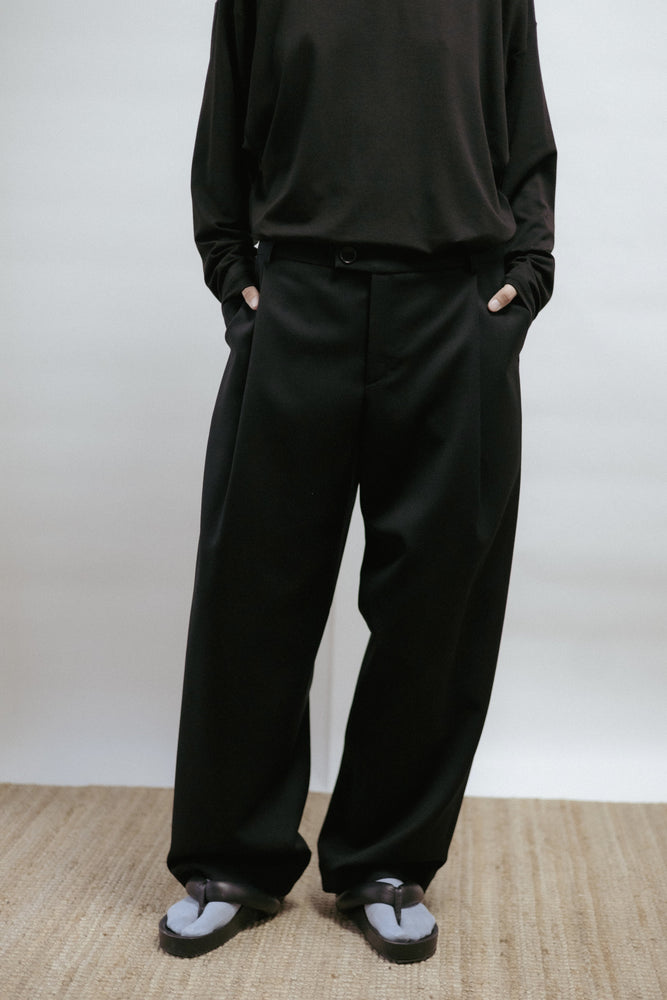 Black wool barrel-leg trousers