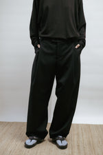 Black wool barrel-leg trousers