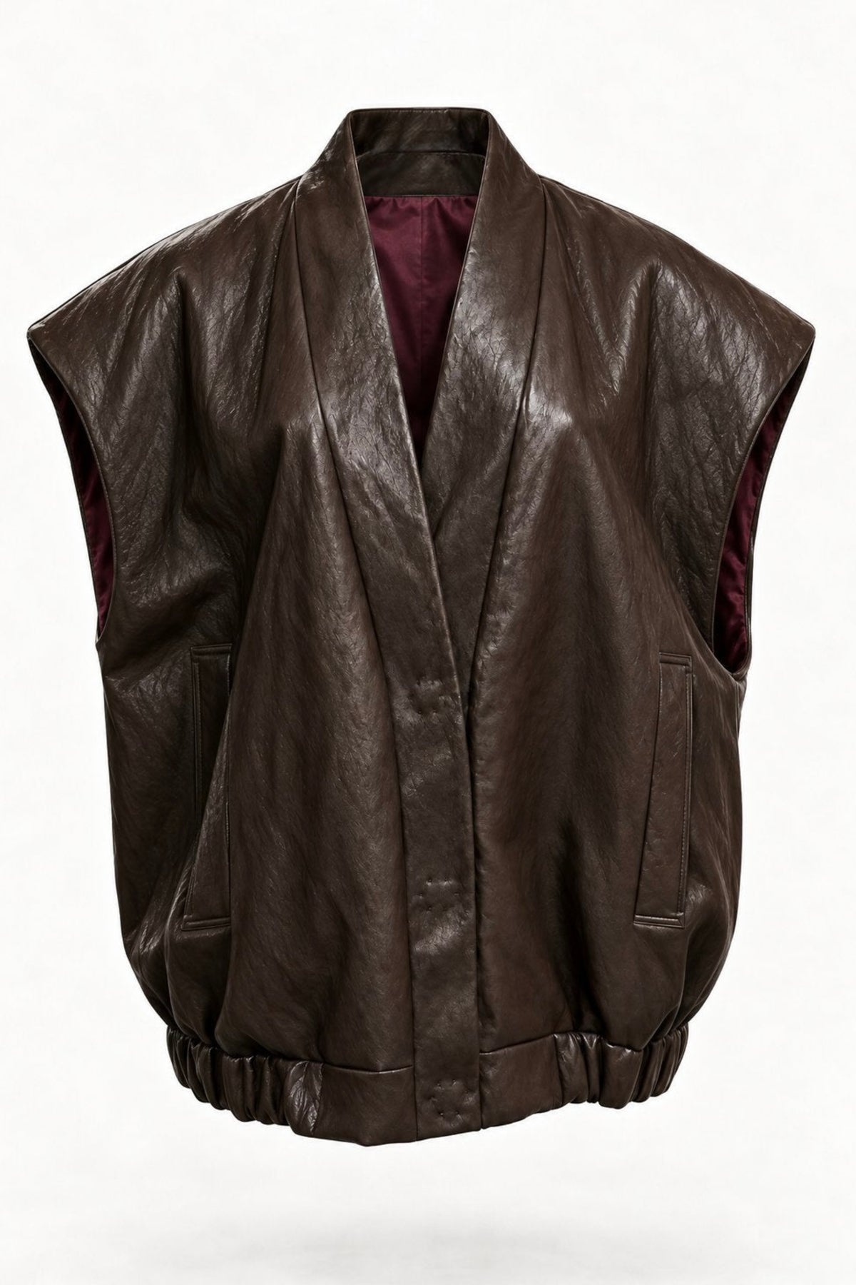 A dark brown faux leather vest with a shawl collar and side pockets, shown against a plain white background.