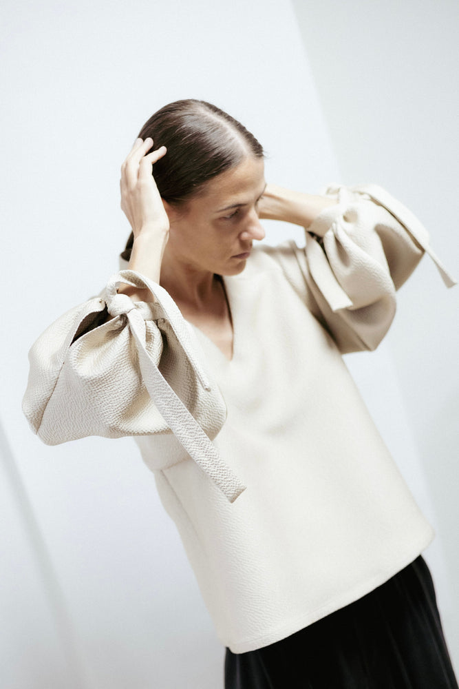 Light gold evening blouse