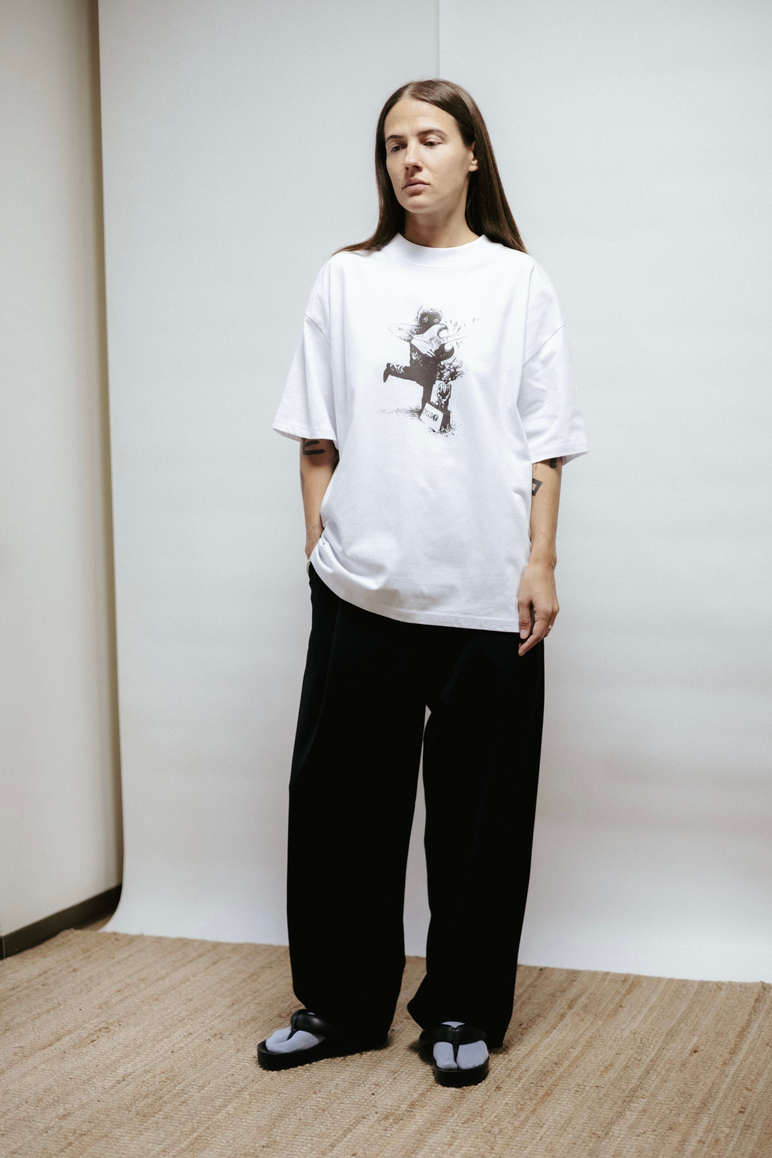 Unisex organic cotton t-shirt with “Disco” print by artist Toomas Pääsuke. Relaxed fit, soft neckline, made in Estonia. Art meets minimalism.