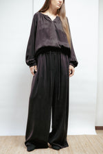 Light gold textured blouse with puff sleeves and V-neck. Elegant A-line silhouette, non-creasing fabric, made in Estonia.