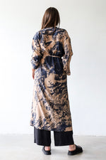 Wrap dress in printed silk