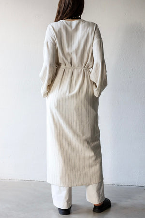 Wrap dress in striped linen crepe