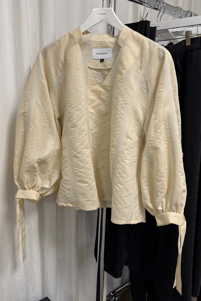 Sculptural sleeve blouse